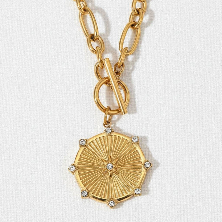 Gold Starburst Pendant Necklace
