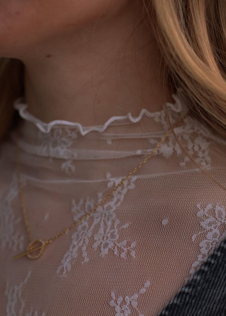 The Elara Lace Mock Neck