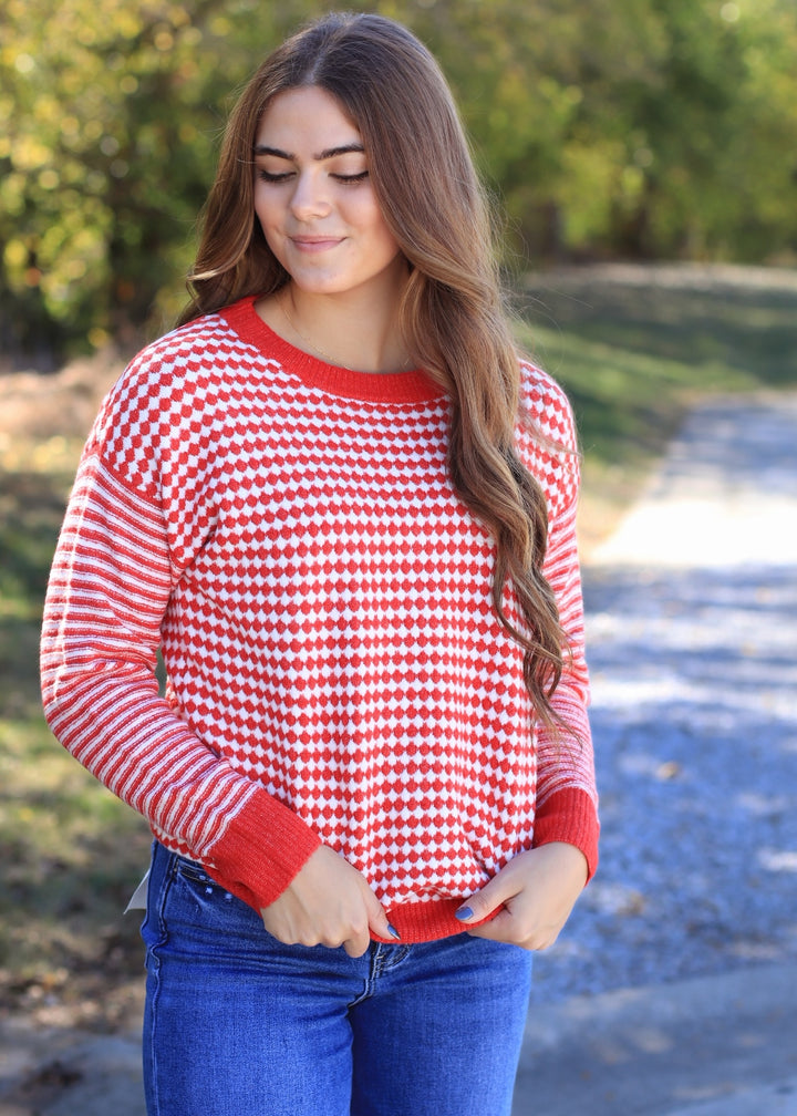 The Mistletoe Check Sweater in Red