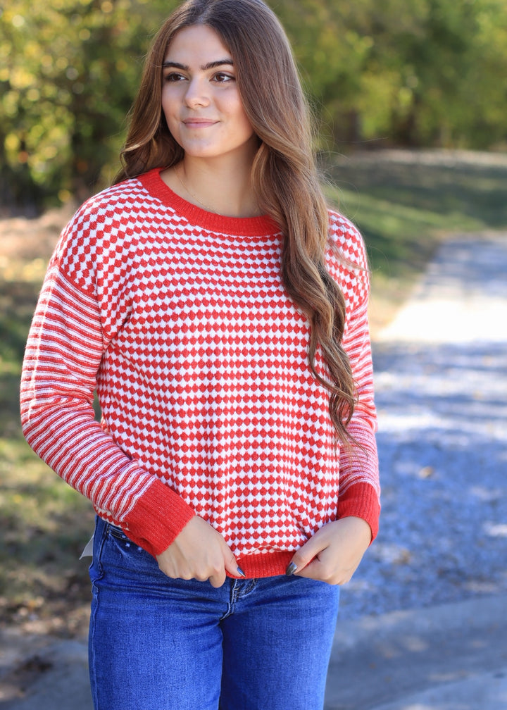 The Mistletoe Check Sweater in Red