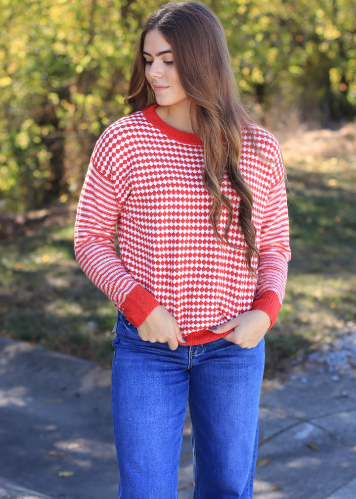 The Mistletoe Check Sweater in Red