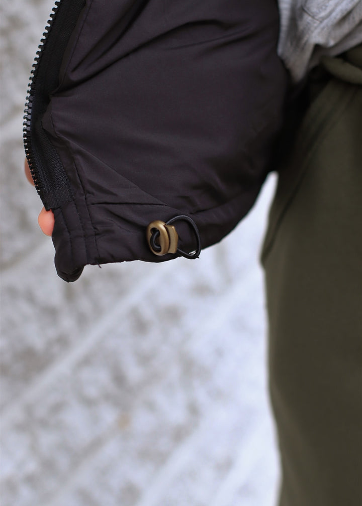 DOORBUSTER High Neck Puffer Vest in Black