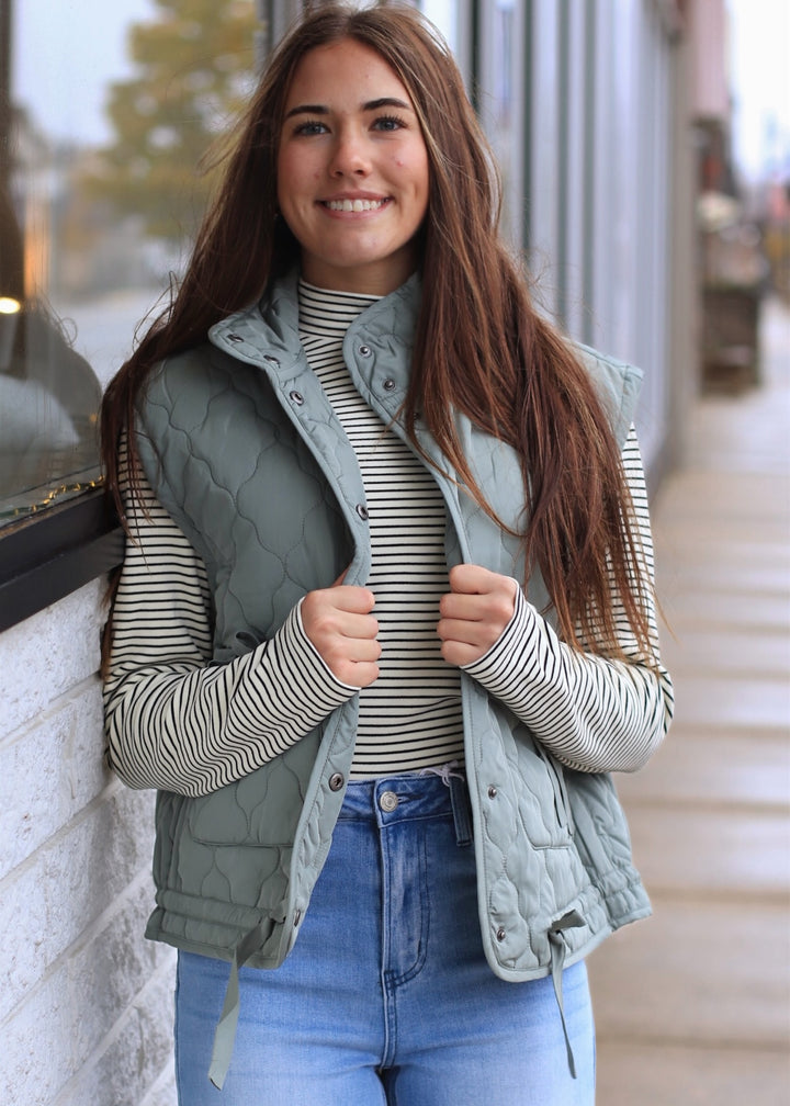 The Alpine Tie Puffer Vest in Dusty Sage
