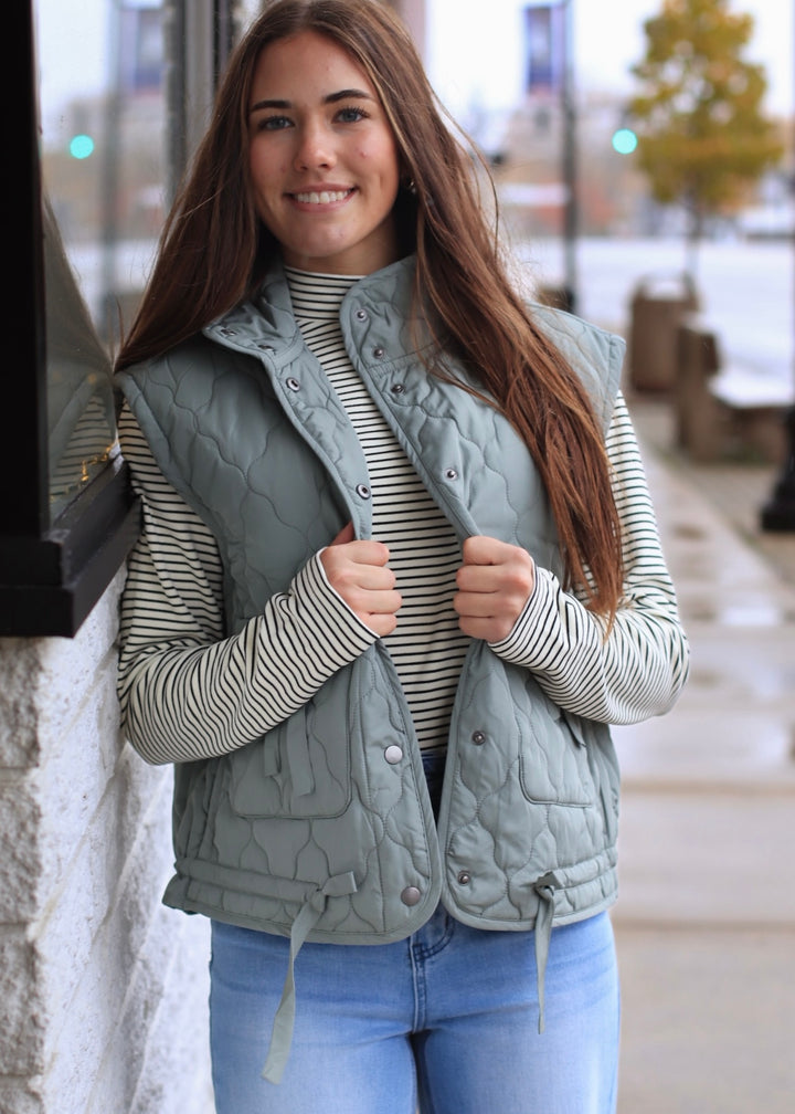 The Alpine Tie Puffer Vest in Dusty Sage