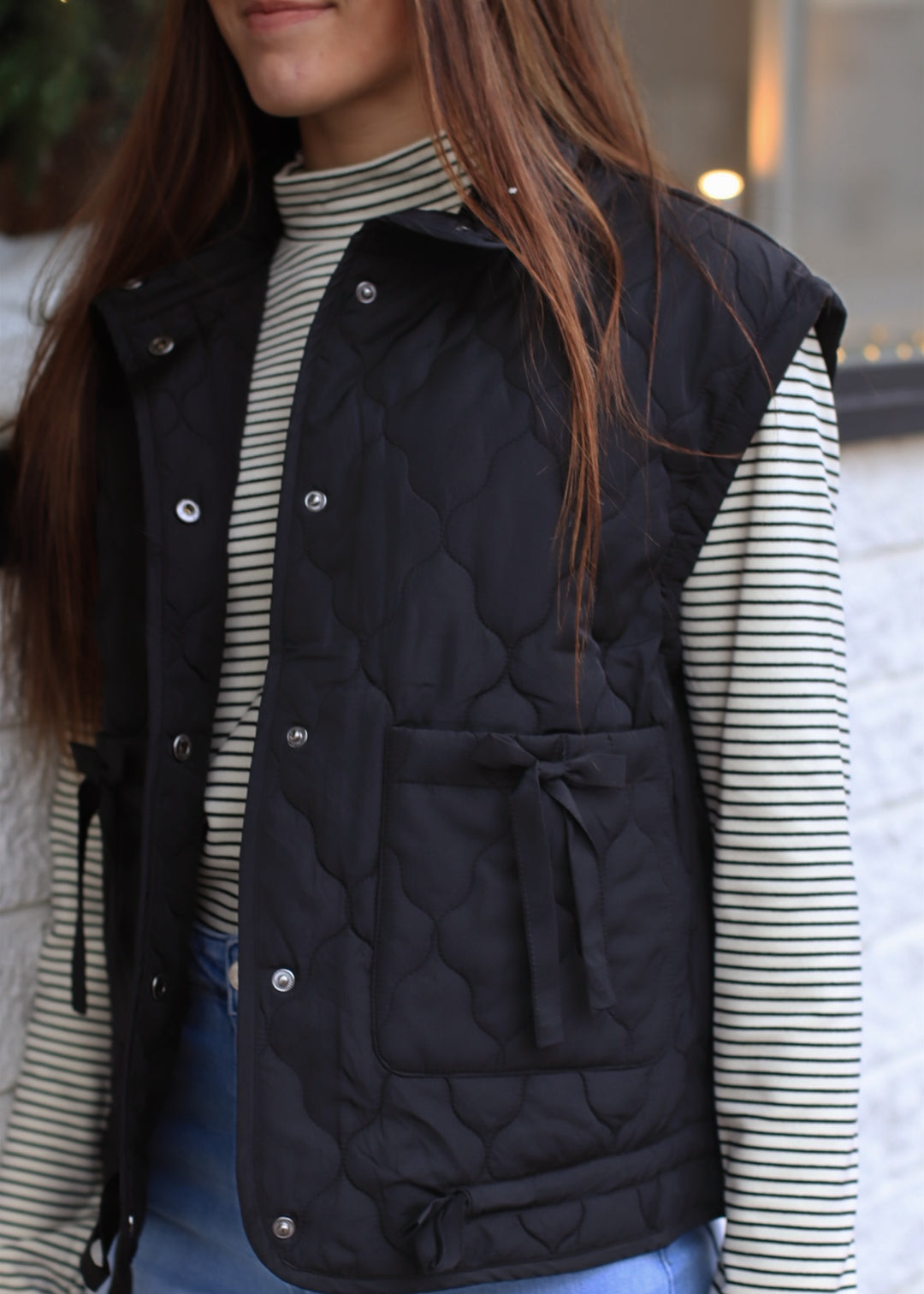 The Alpine Tie Puffer Vest in Black